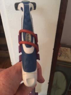 Ape Scrape Razor Extender/Extension handle patented to hold any size or style razor. Made in USA