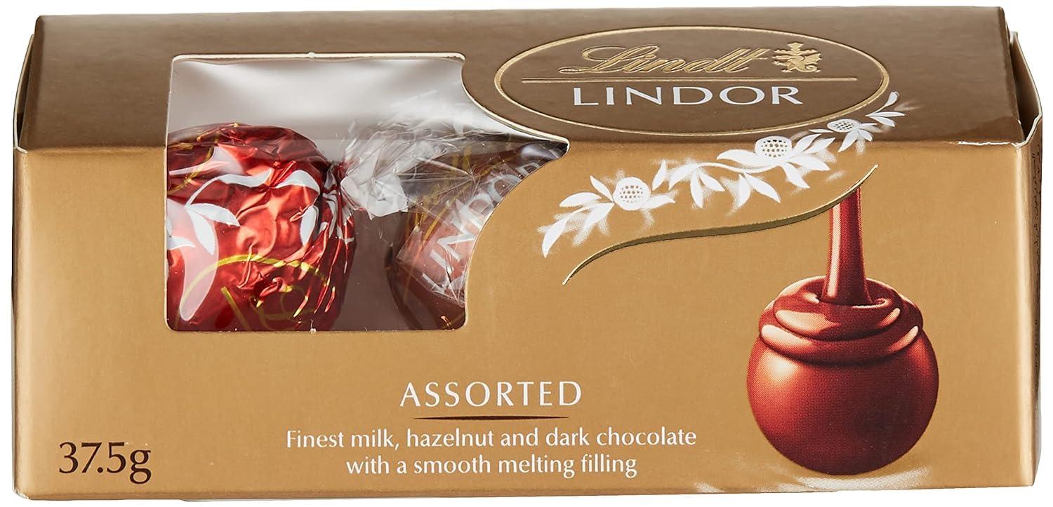 Lindt Lindt Lindor Milk Chocolates Box 137G Gift - Pack Of 2 Get Two Trio Assorted 37.5 G Free Special Gifts For Holi - 1000 Gm