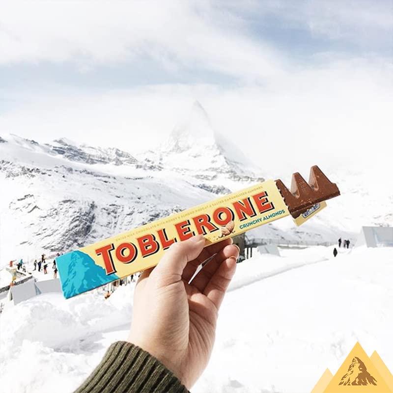 Generic Toblerone Of Switzerland Swiss Milk Chocolate Candy Bars With Salted Caramelized Almonds And Honey And Almond Nougat, 100 Gram (Imported, Pack Of 1)