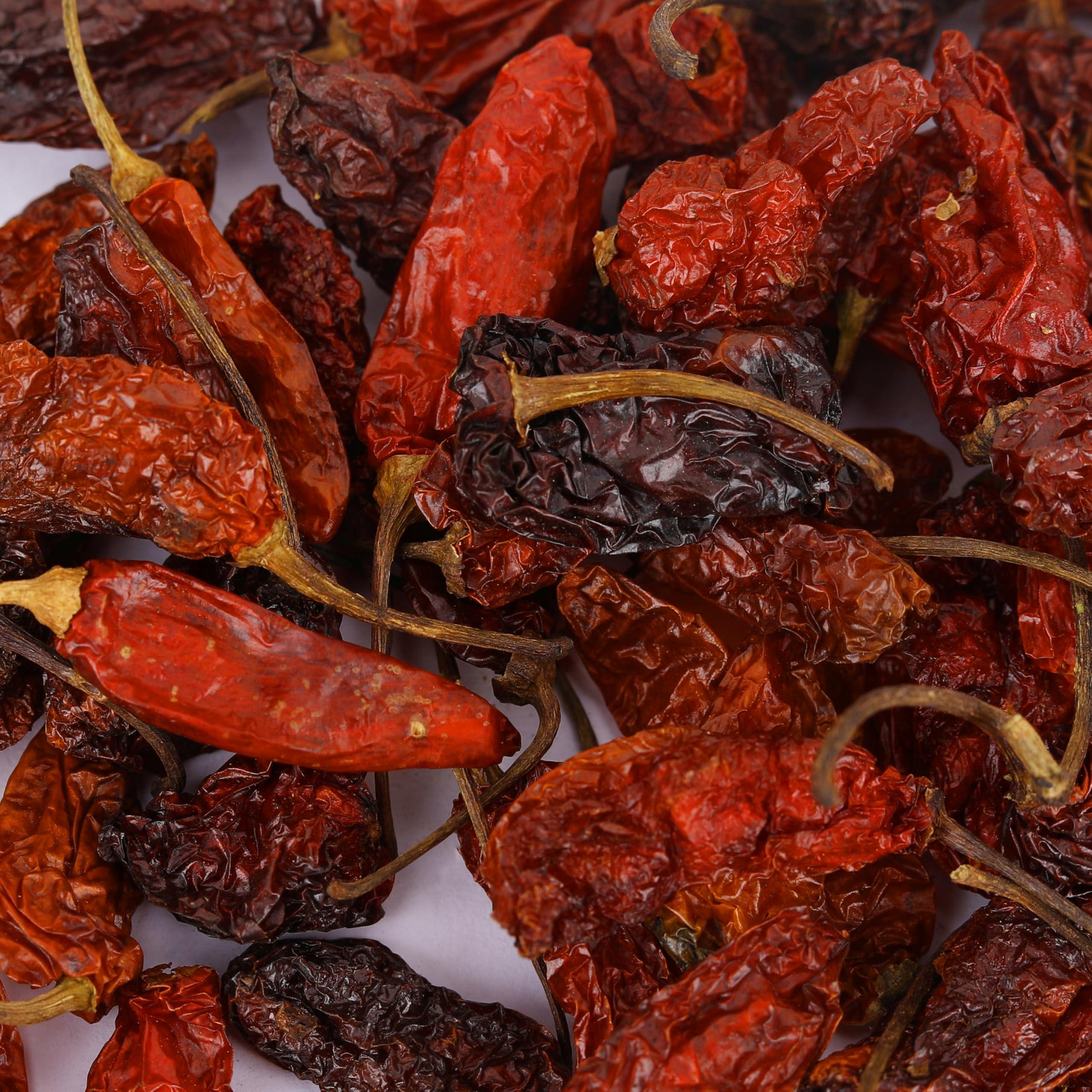 NOURCERY Nourcery Bhut Jolokia Chilli Whole 100 Grams | Ghost Pepper | Naga Chilli | King Chilli | Raja Mirchi | Sundried | Organically Grown | Fire up any dish with a dash of this chilli | Hottest Chilli in India Bhut Jolokia Pods (100gm), Vaccum Packed