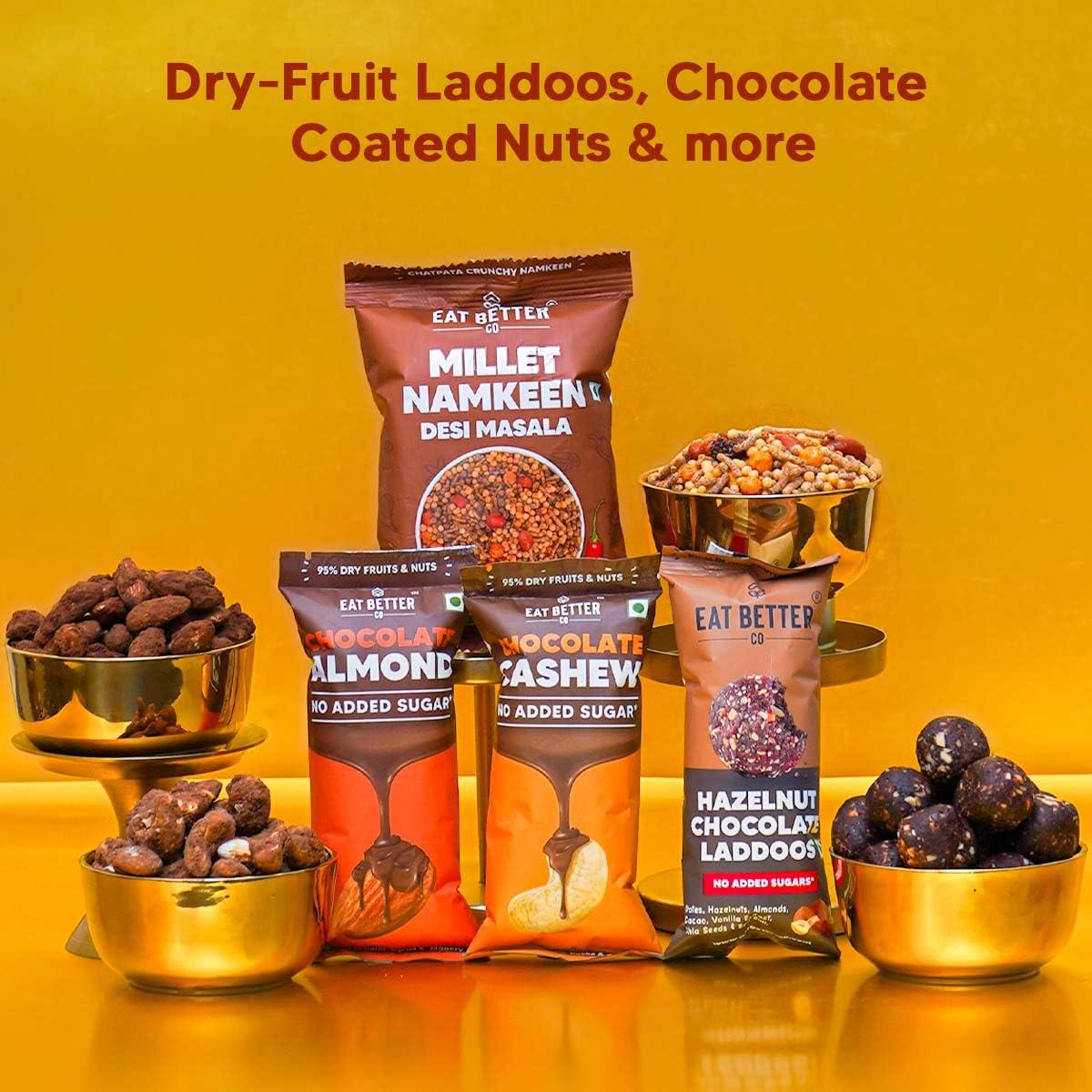 EAT BETTER CO Anmol Rakhi Gift Hamper - 7 Items Combo Pack - Chocolate Coated Almonds & Cashews - Four packets of Dry Fruits with Roli, Chawal & Rakhi | Raksha Bandhan Box for Brother - Rakhi with Gift Set