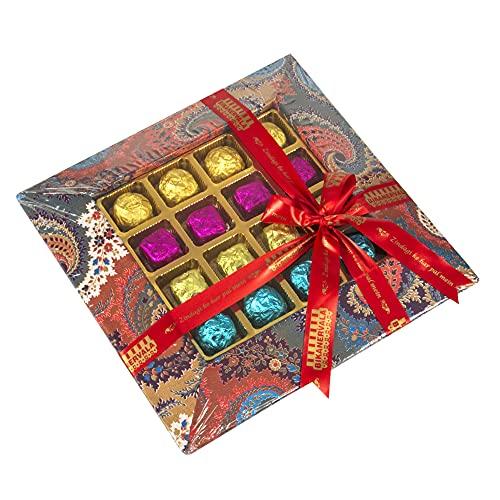 Feastive Celebrations Feastive Celebrations Bikanervala Chocolate Pralines Tray (16 Pcs) with a set of 5 Blessed Rakhis , a pair of Ganesha Soan, Pooja Rakhi, Kesar(branded) and Chawal. Complimentary Surprise gift for your
