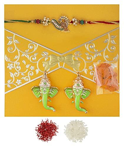 Feastive Celebrations Feastive Celebrations Bikano Kaju Katli (250 grams) with Mayur Dhwaj Rakhi, a pair of Ganesha Soan, Pooja Rakhi, Kesar(branded) , Chawal.Surprise gft for brother.